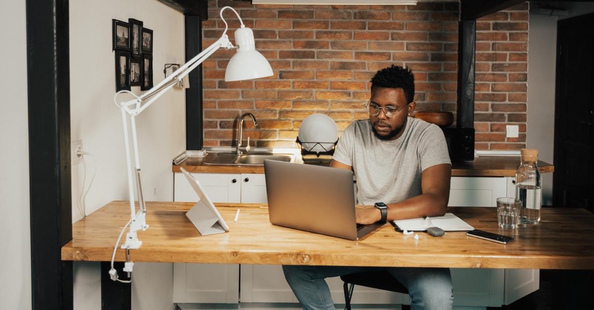 guy on home laptop